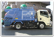 資源回収車（小型プレス車）の右側面を撮影した写真